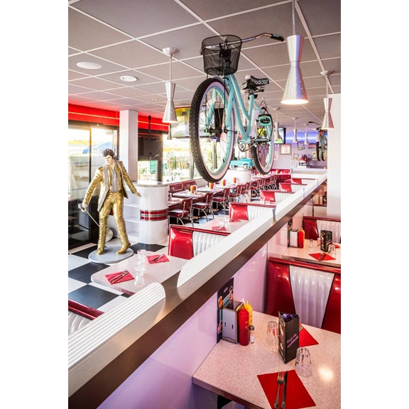 quarterback_american_house_restaurant_diner_booth_seating_with_bicycle