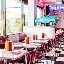 quarterback_american_house_restaurant_diner_seating_with_pedal_car